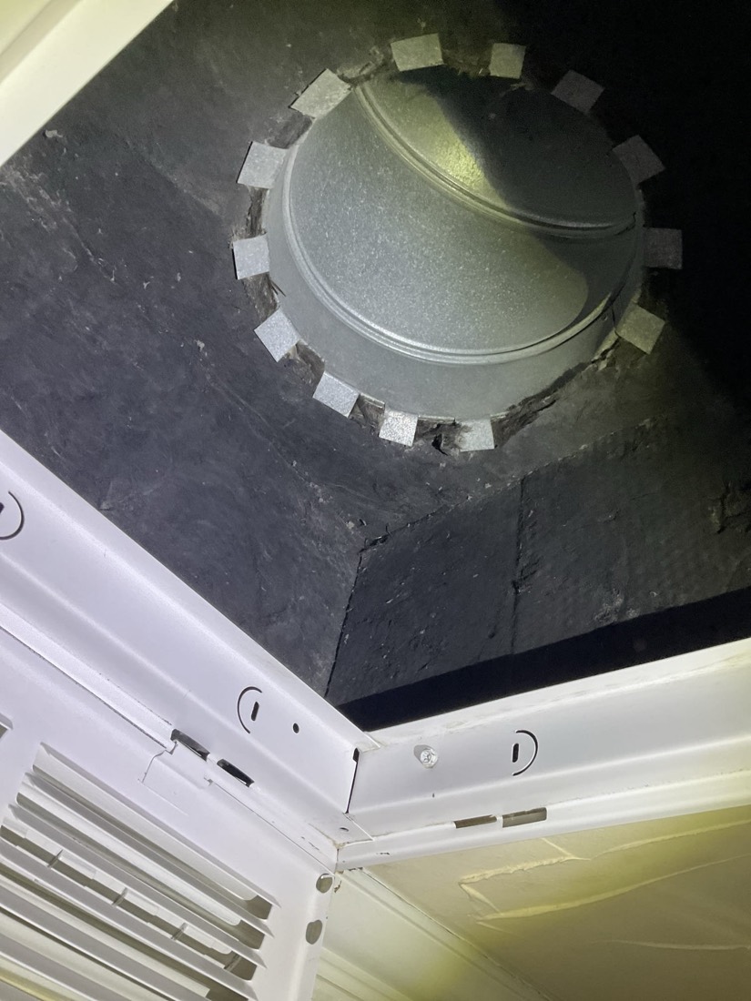 Cleaned duct register with dampers visible in ceiling.