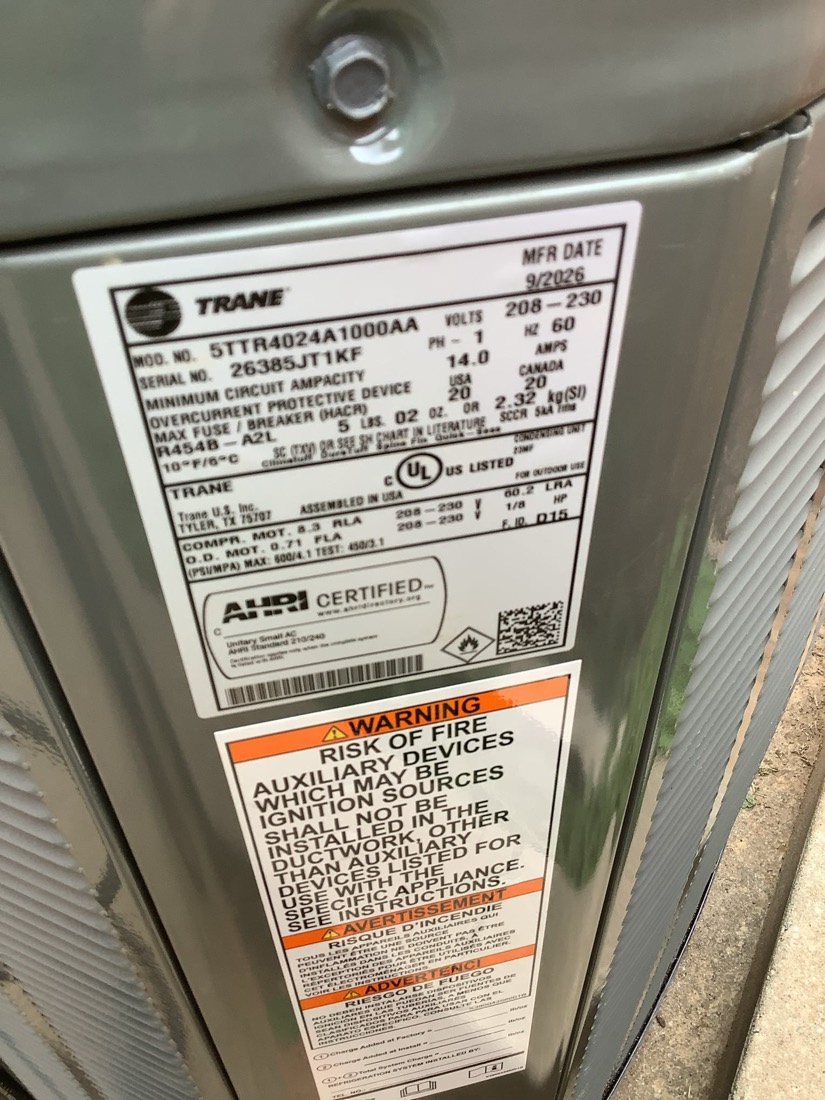 Trane furnace equipment label with manufacturer certification marks.