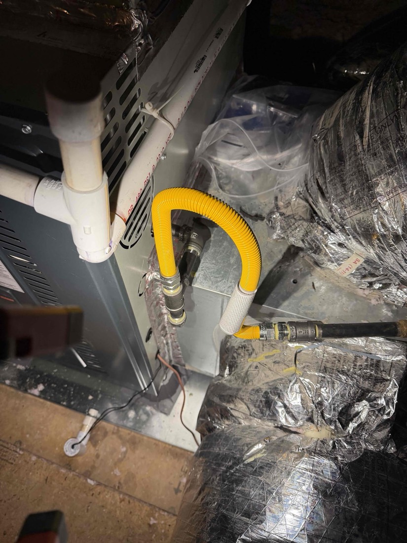 Installed furnace and AC unit with yellow flex ductwork