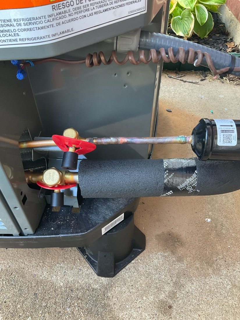 Refrigerant manifold with gauges and connection lines for HVAC service